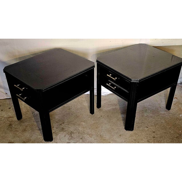 Beautifully laquered Mid-Century deep pair of side tables in giving everything from Hollywood, to Chinoirsiere!. There are...