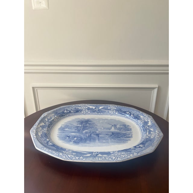 Blue and white is timeless and this large English ironstone platter will add patina to your tabletop when entertaining a...