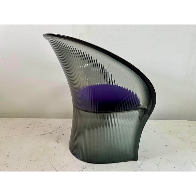 This gray toned all acrylic chair designed by famed designer, Pierre Paulin for Magis, has original seat and fabric which...
