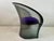 This gray toned all acrylic chair designed by famed designer, Pierre Paulin for Magis, has original seat and fabric which...