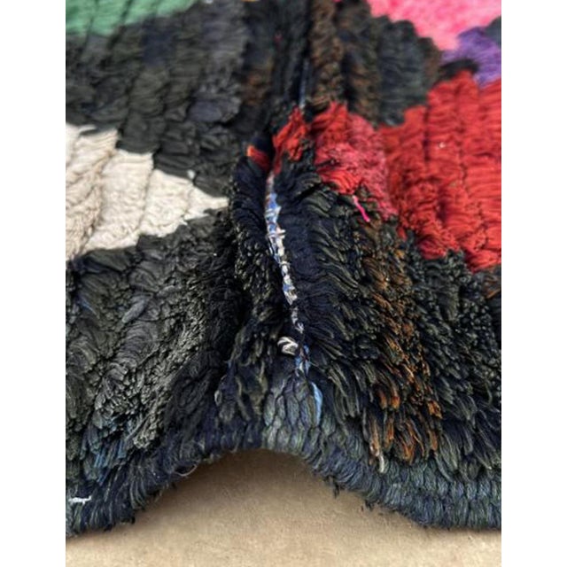 Vintage Moroccan Berber Rug – Handwoven Wool with Diamond Motifs This vintage Moroccan Berber rug is a striking handmade...