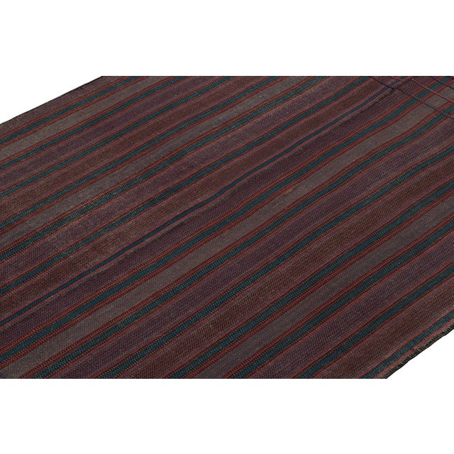 Handwoven in wool circa 1950-1960, this 6x7 vintage Persian Kilim is a new curation from the Rug & Kilim collection. On...