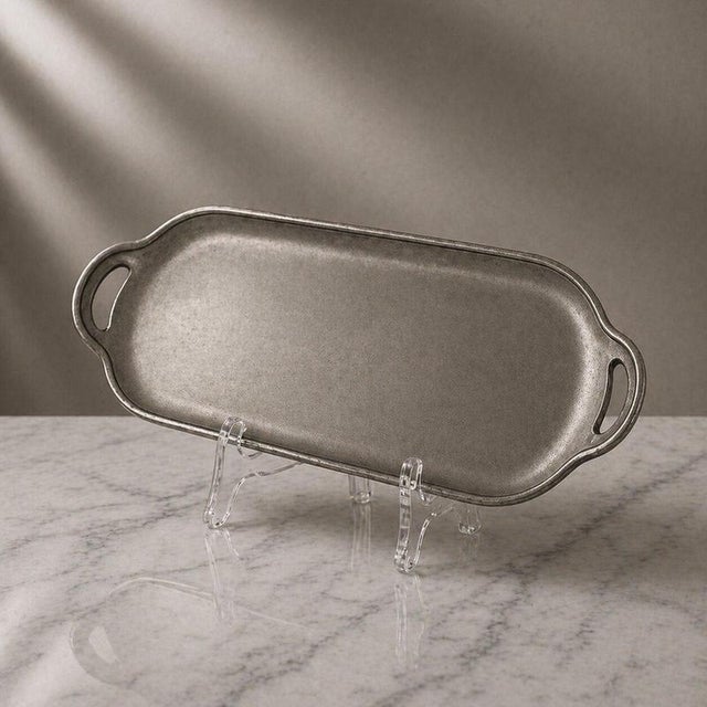 A refined and timeless Swedish pewter tray by Schreuder & Olsson, Stockholm, dating to the mid-20th century. This elegant...