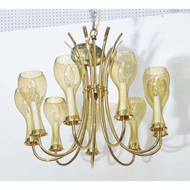 Light up your retro room in style with this glamorous chandelier from the 1970s. Eight candelabra lights provide ample...