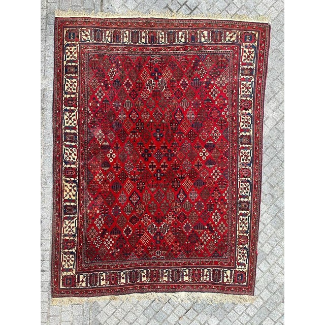 Nice early 20th century Joshaghan rug with beautiful stylized floral design and nice natural colours, entirely hand...