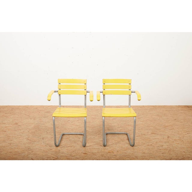Model 1024 Garden Chairs with Galvanized Steel Tube Frames and Yellow Wooden Slats, 1934, Set of 2 For Sale - Image 5 of 13