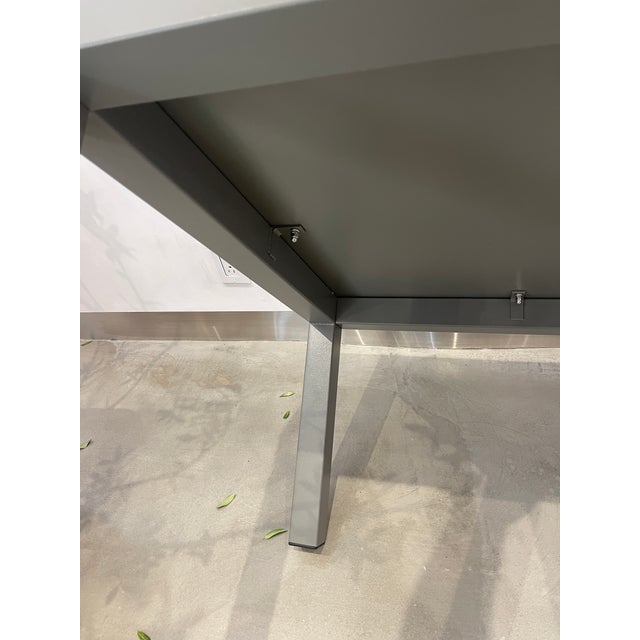 Brand new edge Coffee table ALUMIMUM Warm grey 28X28X17 50 LB new $1175