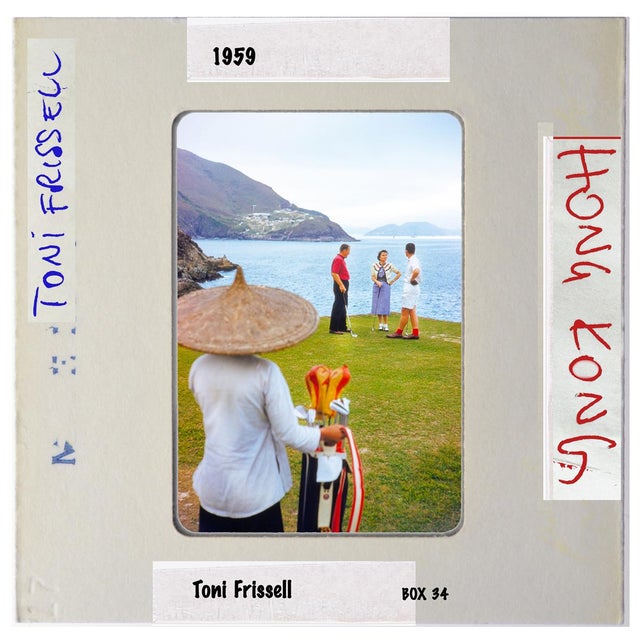 Print of a slide featuring a fashionable looking group play golf on a coastal golf course, overlooking a bay in Hong Kong,...