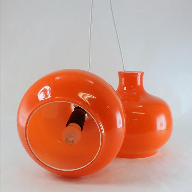 Mid-Century Space Age Orange Pendant Lamps, Sweden, 1960s, Set of 2, in Flawless conditions. Designed 1960 to 1969 This...