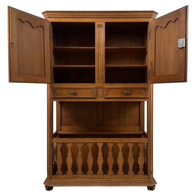 An impressive early 20th-century French cupboard, finely crafted from oak and distinguished by its substantial...