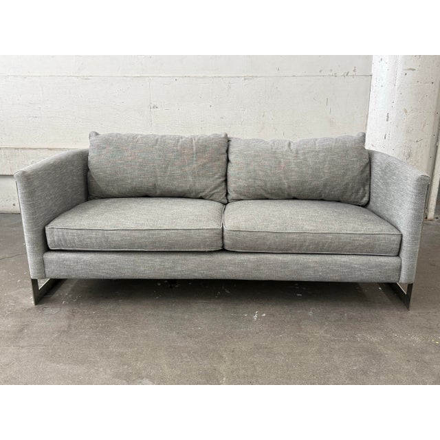 Design Plus Gallery presents a Contemporary Sofa from Bernhardt. Upholstered in a soft gray woven fabric, the sofa...