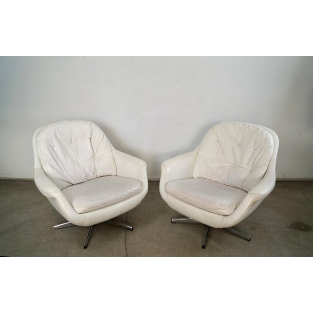 Pair of Mid century Swedish Modern lounge chairs for sale. They were manufactured by Selig in the 1960's, and were made in...