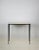 Slender wrought iron and parchment 'Etude' console.