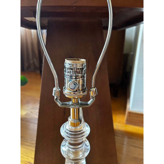 Illuminate your space in a glamorous, modern style with this 24 inch 7 pound table lamp! Crafted of transparent glass,...