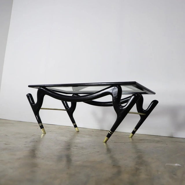 We offer this coffee table with the amazing and characteristic design of Eugenio Escudero, made in México in painted wood,...