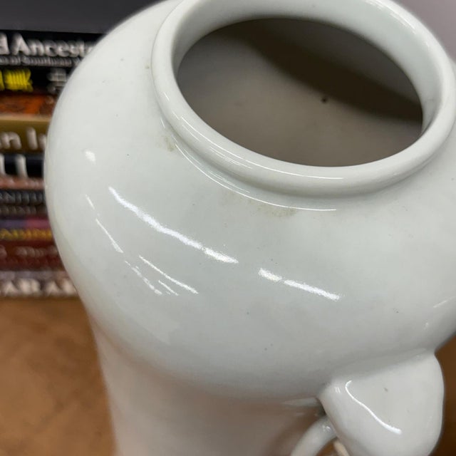 Early 20th Century Tall White Ceramic Vases with Elephant Head Handles - A Pair For Sale - Image 5 of 13