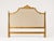 An exquisite Italian Neoclassical Louis XVI style upholstered headboard featuring an ornate, hand-carved solid wood frame...