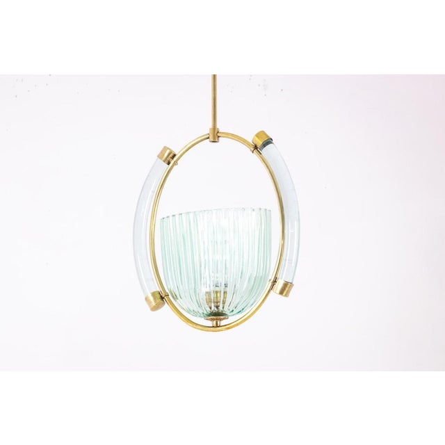 Barovier & Toso, para. Murano glass lantern, matt gold brass finishes. Italian work realized in the 1950s. This piece is...