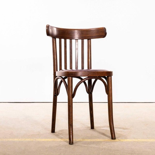 1950’s Classic Bistro Red Upholstered Dining Chairs. Good quality classic bentwood chairs with a dark oak colour and...