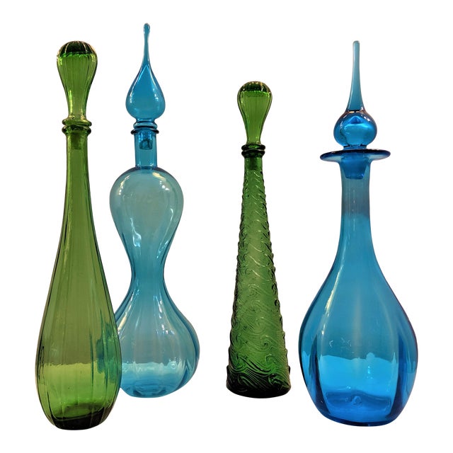 Set of 4 Glass BottlesGlass Bottle Collection Chairish