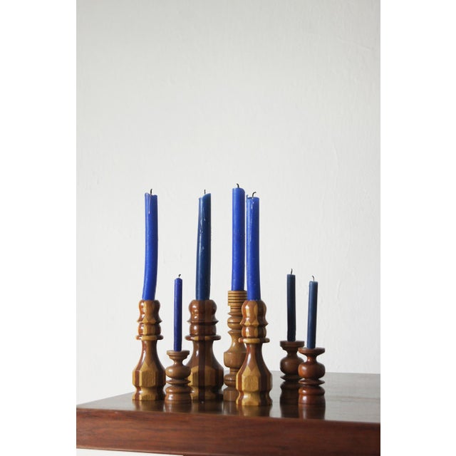 Set of seven masterfully turned wooden candlesticks The height of the candlesticks varies from 16.3 cm to 8.5cm - the...