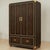 This is a regency campaign style leather and brass bar cabinet. It is completely framed in brass nailheads and has...