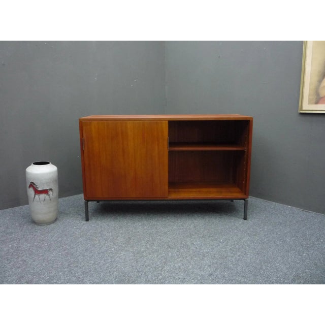 Sideboard by Herbert Hirche. Made in the 1960s. Material: wood and veneered with teak. from first owner and in good...