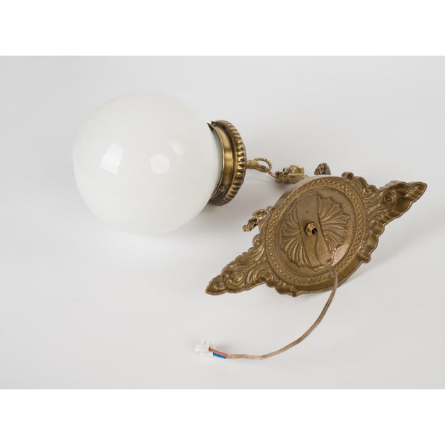 Gothic 1960s Spanish Gothic Gold Brass Winged Griffin Wall Sconce With Opaline Glass Globe For Sale - Image 3 of 8