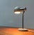 Rare table lamps from Kaiser Leuchten. The light head consists of a chrome cylinder that is connected to a chrome -plated...