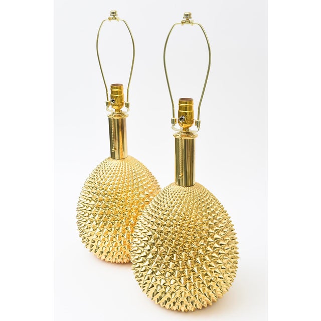 This stunning vintage rare pair of Italian 1970's ceramic studded lamps in the form of a semi pineapple have gold...