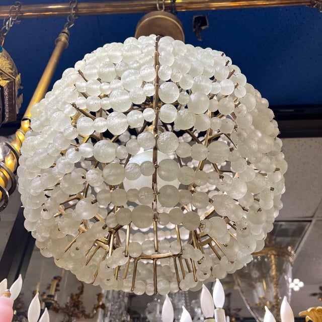 Spherical chandelier with brass frame and over 720 glass beads in various sizes. 16 inches across and 26 inches tall....