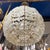 Spherical chandelier with brass frame and over 720 glass beads in various sizes. 16 inches across and 26 inches tall....