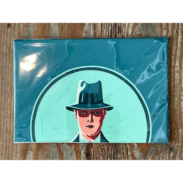 Executed with a bold, graphic sensibility, this mid-century modern figurative painting on paper captures an enigmatic male...