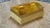Elegant rectangular Italian decorative box crafted from translucent honey-toned marble, featuring a sculpted mosaic-...