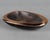 A vintage mid century modern bowl or ashtray by Ben Seibel for Jenfred-Ware. Heavy cast composite alloy plated in copper...