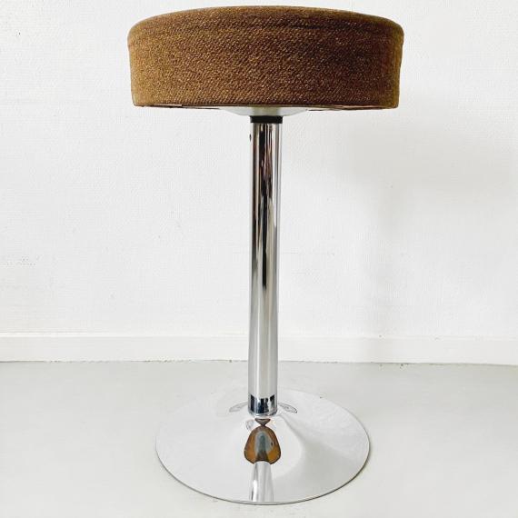 Nice space age trumpet foot stool in chrome with a brown wool upholstery. This stool is inspired by the Eero Saarinen...