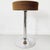 Nice space age trumpet foot stool in chrome with a brown wool upholstery. This stool is inspired by the Eero Saarinen...