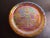 This is a vintage Marigold Carnival Glass 8" Independence Hall PA Decorative Plate. Procured at auction