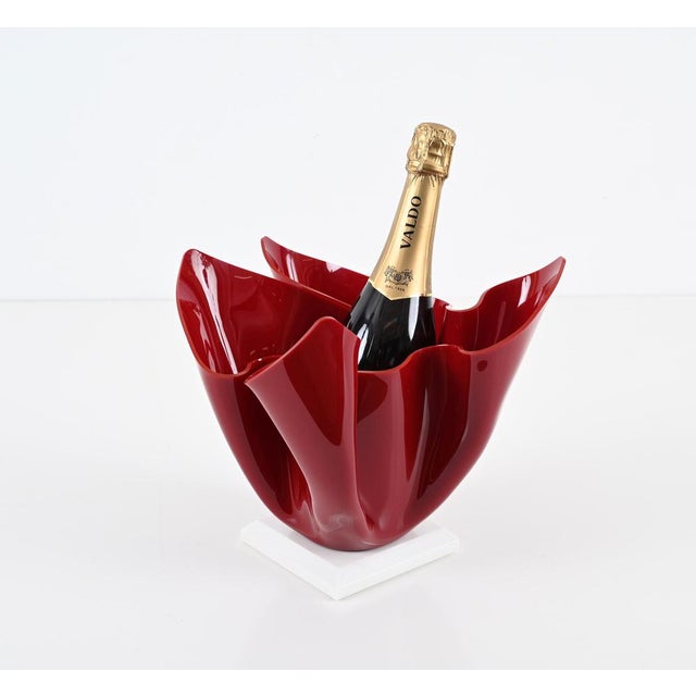 Wonderful centrepiece in an elegant dark vibrant red acrylic with a white base. This amazing item was produced in...