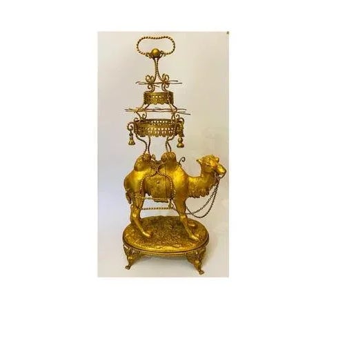 Liqueur service carried on a camel Gold metal and blue opaline 2 carafes and their stoppers 12 liqueur goblets Height of...