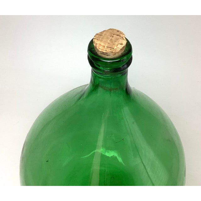 Early 20th Century Antique Demijohn Green Glass Bottle in Original Basket For Sale - Image 5 of 6