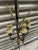 Pair of Italian candle wall sconces made of gilt wood and metal. They are designed as swords and are decorated with...