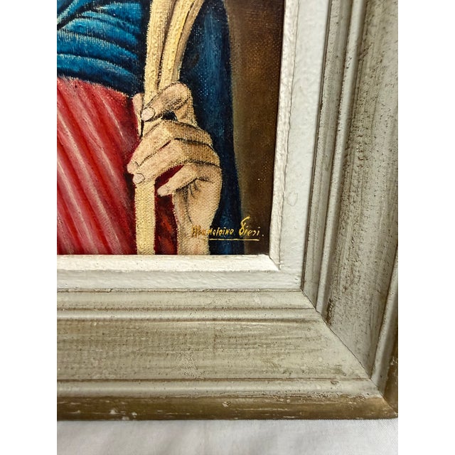 Small framed painting on canvas of a religious figure. Possibly origin from France. The frame is signed in the lower right...