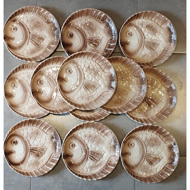 Magnificent zoomorphic fish-themed service in glazed ceramic, made by the Sarreguemines factory. This charming set...