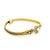 Crafted in Italy circa 1970, this elegant flexible bangle is beautifully made in 14 karat yellow gold and centered with...