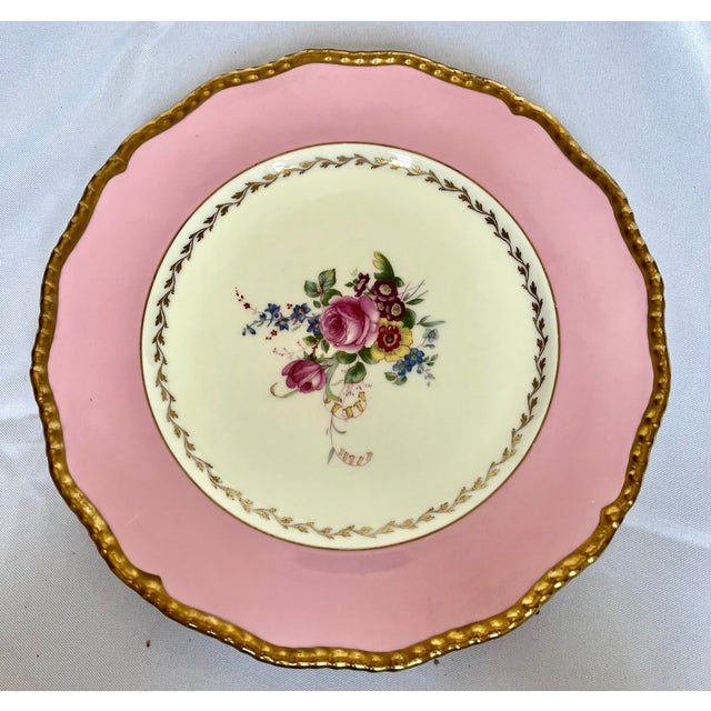 Stunning complete service set of twelve (12) fine bone china dinner plates crafted by the legendary Royal Doulton in...