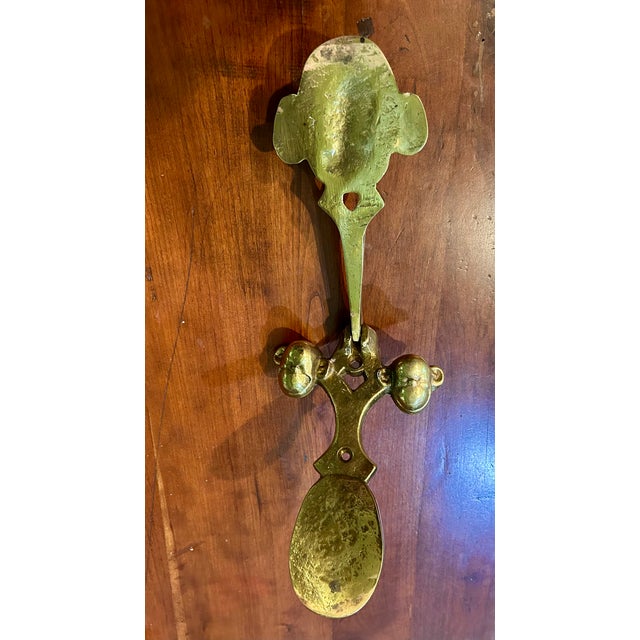 Brass Monkey-Head Door Knocker A charming figural door knocker cast in heavy solid brass, featuring two expressive monkey...