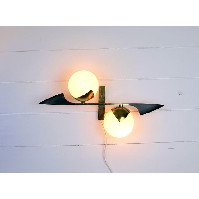 Superb Maison Arlus sconce. Circa 1950 two lights,40 watts max per bulb. US rewired and in working condition. Opaline...