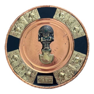 Peruvian Vintage Brass and Copper Wall Hanging Plate With Tumi Native Figure For Sale