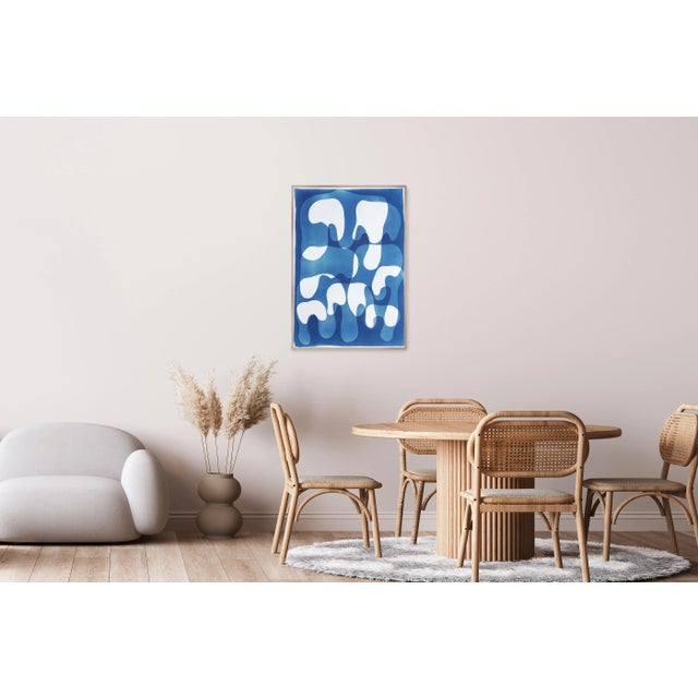 This unique monotype cyanotype, rendered in rich blue tones, invites the viewer into a dreamlike rhythm of interwoven...